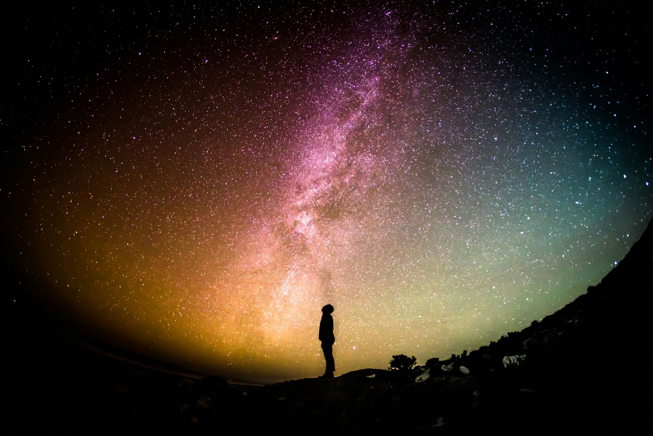 nonprofit-fundraising-ideas-hero Person silhouetted against starry night sky representing the endless possibilities of creative nonprofit fundraising